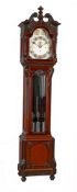 A FINE EDWARDIAN CARVED MAHOGANY TUBULAR-BELL CHIMING REGULATOR WITH AUTOMATIC DAILY TUNE SELECTION