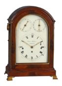 A REGENCY BRASS MOUNTED FIGURED MAHOGANY QUARTER-CHIMING TABLE/BRACKET CLOCK
