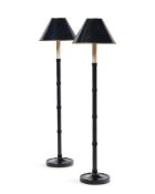 A TALL PAIR OF EBONISED RING TURNED TABLE LAMPS, IN THE MANNER OF VAUGHAN