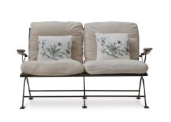 A WROUGHT IRON TWO SEAT BENCH WITH MATCHING ARM CHAIRS