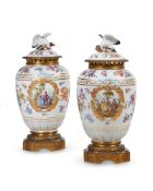 PAIR OF BERLIN-STYLE PORCELAIN GILT-METAL-MOUNTED VASES AND COVERS, GERMAN