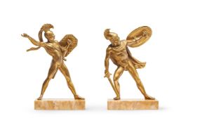 A PAIR OF GILT BRONZE BOOKENDS FORMED AS FIGURES OF GREEK WARRIORS