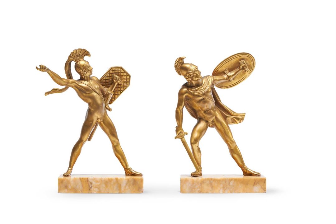 A PAIR OF GILT BRONZE BOOKENDS FORMED AS FIGURES OF GREEK WARRIORS - Image 1 of 4