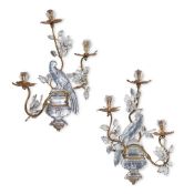 MAISON BAGUES; A PAIR OF ROCK CRYSTAL, CUT GLASS AND GILT METAL WALL LIGHTS