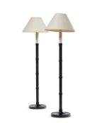 A TALL PAIR OF EBONISED RING TURNED TABLE LAMPS IN THE MANNER OF VAUGHAN