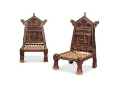 A MATCHED PAIR OF CARVED HARDWOOD AND METAL MOUNTED CHAIRS, INDIAN