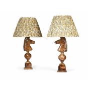 A PAIR OF HARDSTONE TABLE LAMPS CARVED IN THE FORM OF CHESS PIECE KNIGHTS, 20TH CENTURY