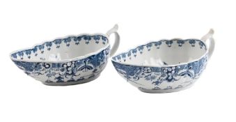 A PAIR OF WORCESTER BLUE AND WHITE PAINTED SAUCEBOATS, CIRCA 1775