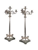A PAIR OF SILVER PLATED FOUR LIGHT CANDELABRA, EARLY 20TH CENTURY, IN POMPEI MANNER