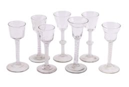 A SELECTION OF OPAQUE-TWIST WINE GLASSES INCLUDING AN ENGRAVED EXAMPLE, THIRD QUARTER 18TH CENTURY