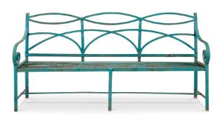 A REGENCY GREEN PAINTED STRAPWORK BENCH
