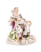 A MEISSEN GROUP OF A WOMAN WITH HOUND, CIRCA 1760