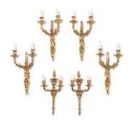 A SET OF FOUR LOUIS XVI STYLE ORMOLU TWIN BRANCH WALL LIGHTS, EARLY 20TH CENTURY