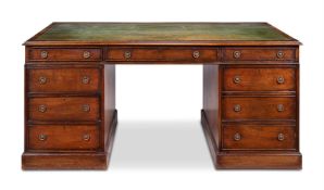 A MAHOGANY PARTNER'S PEDESTAL DESK IN GEORGE III STYLE