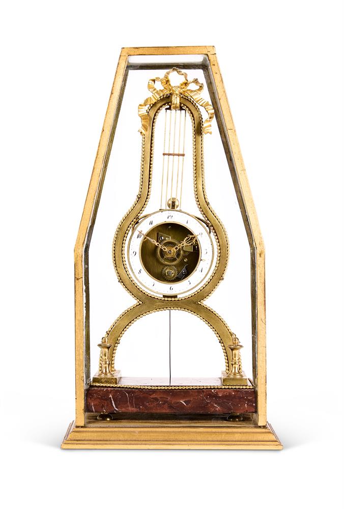 A FRENCH DIRECTOIRE GILT METAL MOUNTED LYRE-SHAPED MANTEL TIMEPIECE, UNSIGNED