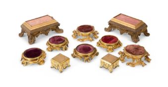A SET OF FOUR ORMOLU CIRCULAR VASE STANDS, FRENCH, 19TH CENTURY
