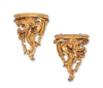 A PAIR OF CARVED GILTWOOD AND COMPOSITION WALL BRACKETS IN GEORGE II STYLE,19TH CENTURY