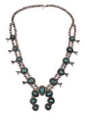 A SQUASH BLOSSOM NECKLACE