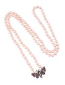 AN ANTIQUE GEM SET BUTTERFLY PANEL TO A LATER CULTURED PEARL NECKLACE
