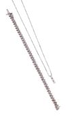 A DIAMOND PENDANT AND LINE BRACELET