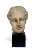 A MARBLE HEAD OF A GODDESS, ROMAN, 18TH CENTURY OR EARLIER