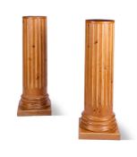 A PAIR OF FLUTED WOOD PEDESTALS, EARLY 19TH CENTURY
