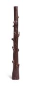 Y A CARVED EBONY MODEL OF A CLUB, INDIAN, 19TH CENTURY