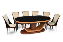 IN THE MANNER OF RUHLMANN; AN ART DECO DINING SUITE; CIRCA 1930