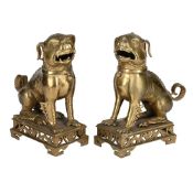 A PAIR OF CHINESE BRASS TEMPLE DOGS, 19TH OR 20TH DYNASTY