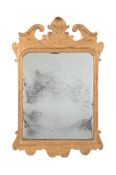 A CARVED GILTWOOD WALL MIRROR, 19TH CENTURY, IN GEORGE II STYLE
