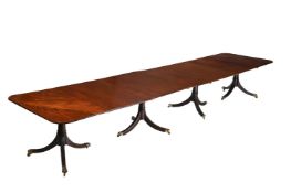 A MAHOGANY FOUR PEDESTAL DINING TABLE IN GEORGE III STYLE