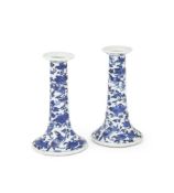 A PAIR OF CHINESE BLUE AND WHITE CANDLESTICK HOLDERS, 18TH CENTURY