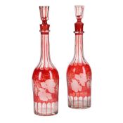 A PAIR OF BOHEMIAN RED-FLASH DECANTERS AND STOPPERS, THIRD QUARTER 19TH CENTURY