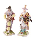 A PAIR OF BERLIN FIGURES OF MALABAR MUSICIANS, LATE 19TH CENTURY