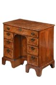 A BURR WALNUT KNEEHOLE DESK, 18TH CENTURY AND LATER
