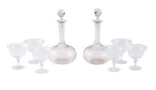 A PAIR OF GLOBULAR DECANTERS AND FACETTED STOPPERS, 20TH CENTURY
