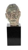 A FIRED CLAY MODEL OF A HEAD, 20TH CENTURY