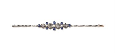AN EARLY 20TH CENTURY GEM SET BRACELET