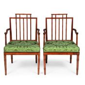 AN UNUSUAL PAIR OF REGENCY SATINWOOD LIBRARY ARMCHAIRS TURNED TO SIMULATE BAMBOO, CIRCA 1815
