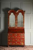 A SCARLET LACQUER AND GILT CHINOISERIE DECORATED BUREAU CABINET, IN QUEEN ANNE STYLE