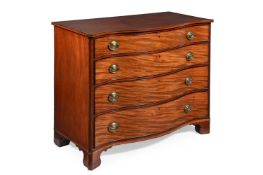 A GEORGE III MAHOGANY SERPENTINE FRONTED CHEST OF DRAWERS, CIRCA 1770