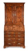 A GEORGE II WALNUT AND LINE INLAID BUREAU BOOKCASE, MID 18TH CENTURY