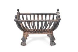 A REGENCY CAST IRON FIRE GRATE BASKET, CIRCA 1815