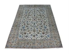A KASHAN CARPET, Signed, approximately 455 x 320cm
