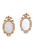 A PAIR OF CARVED GILTWOOD MIRRORS, IN GEORGE III STYLE, 20TH CENTURY