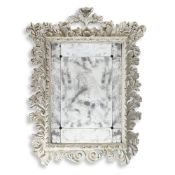 A LARGE CONTINENTAL CARVED WOOD AND WHITE PAINTED MIRROR, 18TH CENTURY AND LATER