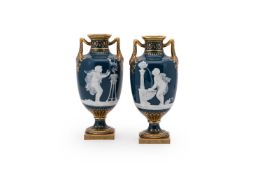A RARE PAIR OF MINTON PÂTE SUR PÂTE TWO HANDLED VASES, BY MARC-LOUIS SOLON, LATE 19TH CENTURY