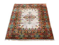 A PERSIAN SILK CARPET, approximately 314 x 240cm