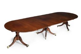 A GEORGE III MAHOGANY TRIPLE PEDESTAL EXTENDING DINING TABLE, CIRCA 1800