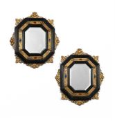 A PAIR OF ITALIAN GILT METAL MOUNTED EBONISED MIRRORS, FLORENCE, SECOND HALF 19TH CENTURY
